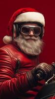 Biker santa claus wearing aviator goggles and riding motorcycle photo