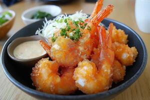 Japanese breaded fried shrimp with tartar sauce and cabbage salad photo