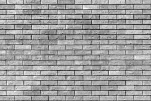 Gray wall of the building. Designer building background. photo