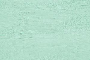 Green stucco texture. Designer interior background. Abstract architectural surface. photo