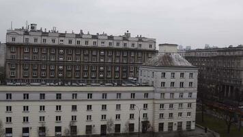 Architectural view in Warsaw as classic and modern structures line the skyline. The view captures the essence of urban life in capital of Poland. Pan view from above video