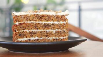 chocolate and cream cake on a plate on table video
