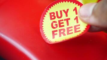 buy 1 get 1 free offer sticker and prodcuts on table video