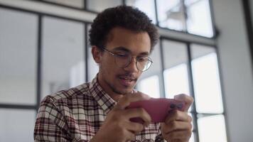 Man Focused on Smartphone Engaged in Digital Interaction video