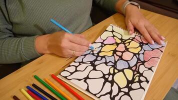 Colorful abstract art creation with colored pencils on notebook video