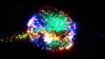 uma esfera consistindo do multicolorido comovente partículas e plasma emite luz, criando uma único atmosfera do celebração e milagre. video