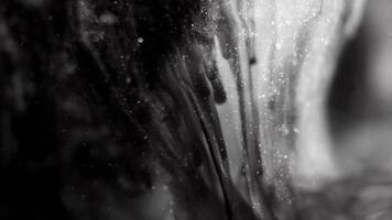 black and white abstract macro substance in slow motion video