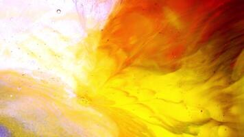 Colorful backdrop with liquid paint in motion for art compositions video