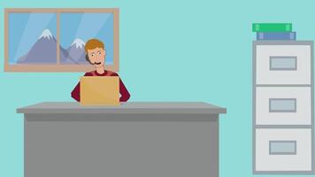 A man sitting at a desk with a laptop video