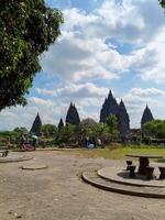 Central Java - Indonesia, July 30, 2024 The iconic Prambanan temple also called Loro Jonggrang. a UNESCO World Heritage Site, with visitors exploring the grounds. photo