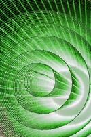 Abstract spiral with glowing green wire texture against a black background, symbolizing color contrast, energy, motion, industrial and futuristic design concepts. Copy space photo