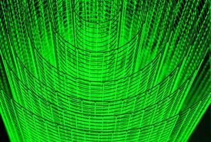 Abstract spiral with glowing green wire texture against a black background, symbolizing color contrast, energy, motion, industrial and futuristic design concepts. Copy space photo
