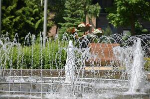 a fountain with water jets photo