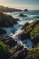 Scenic coastal view with waves crashing against rocky cliffs and lush greenery. photo