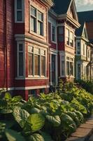 A vibrant row of colorful houses with lush greenery in the foreground. photo