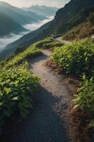 A winding path through lush greenery leads into a misty valley surrounded by mountains. photo