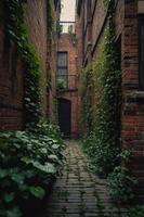 A narrow alleyway lined with brick walls and lush greenery. photo