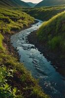 A serene stream flows through lush green hills, reflecting the sunlight. photo