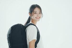A woman with a backpack smiling photo