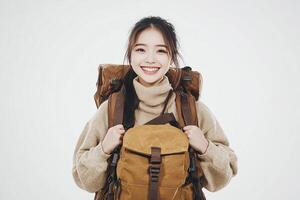 A woman with a backpack smiling photo