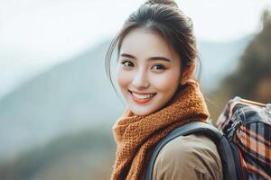 A woman with a backpack smiling photo