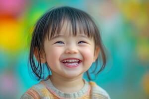 A little girl is smiling and laughing photo