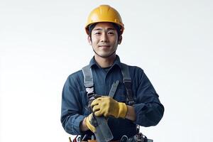 Asian male construction worker holding a hammer photo