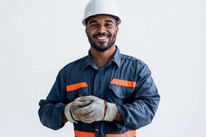 A smiling man in a hard hat and overalls photo