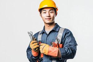 A man in a hard hat holding a wrench photo