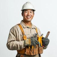 A man in a hard hat holding a tool belt photo