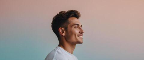 A man smiling in front of a colorful background photo