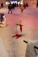 Experience an enchanting Ice Skating Wonderland complete with delightful Penguin Figures photo