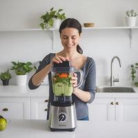 A woman is smiling while using a blender photo