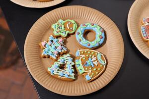 A beautiful plate of Decoratively Iced Holiday Cookies that are perfect for any occasion photo