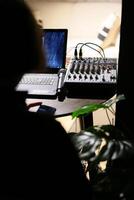 An essential guide to setting up an audio mixer and laptop configuration for media production photo