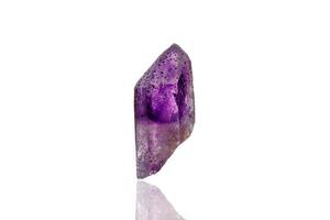 macro mineral stone amethyst on a white background photo