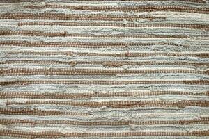 Fabric background, textile, natural fabric texture, trendy color of the year 2025 Mocha Mousse. photo