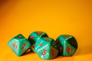 close-up view of four 10-sided dice for board games and role-playing games photo