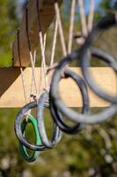 rings hanging on one of the obstacles of an OCR race photo
