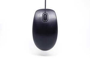 A black computer mouse on a white background photo