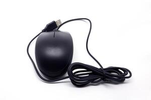 A black computer mouse with a cord attached to it photo