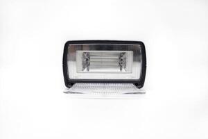 A white light is shown on a white background photo