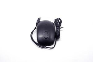 A black computer mouse on a white background photo