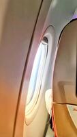 A view of the inside of an airplane with a window photo