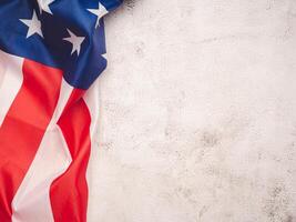 American flag on a cement background with copy space for text photo