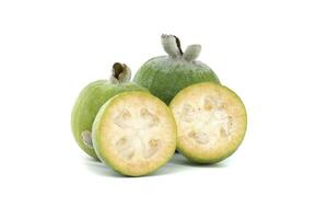 Fresh Ripe Feijoa Fruit and Halved Segment on White Background photo