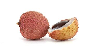 Close-Up View of Fresh Lychee Fruit with Seed on White Background photo