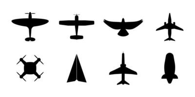 Aircraft Top View Icon Set. Set of Black Silhouette Airplanes, Paper Plane, Drone, Dirigible vector
