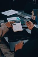 Close up Business people or Real Estate agent explain signing agreement for sale house to client. Property, Insurance, Broker concept. photo