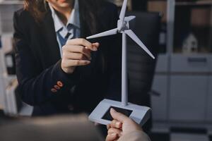Carbon offset price report CO2 emission. Future growth Net zero waste in ESG ethical SME office protect climate change global warming social issues project. Group of asia people Eco friendly SDGs plan photo